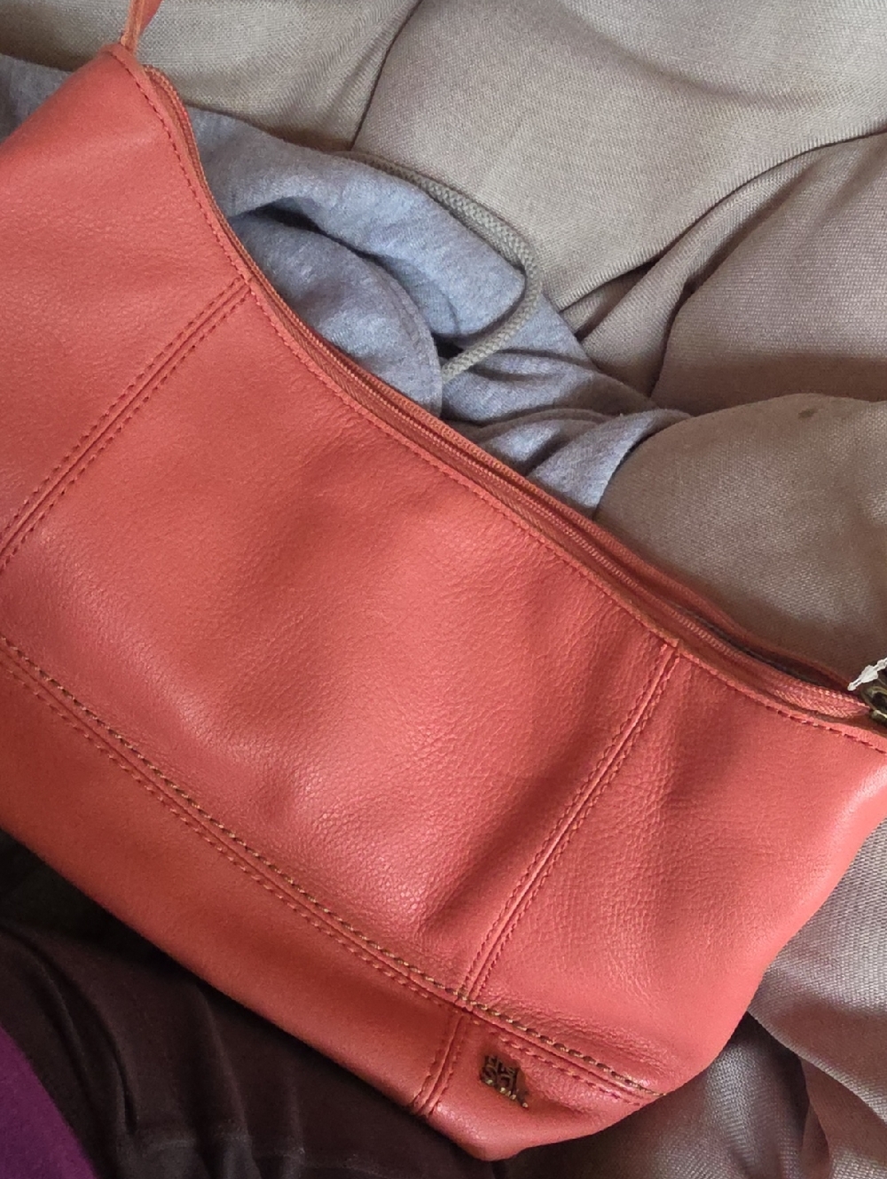 The Sak Coral Pink Leather Wristlet Clutch